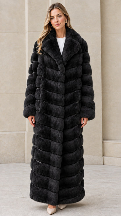 Front full-length view of model wearing Black chevron maxi faux fur coat