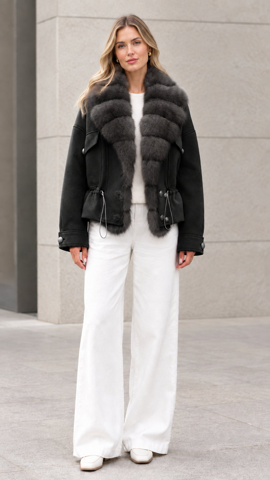 Woman wearing black faux fur trim drawstring waist short coat