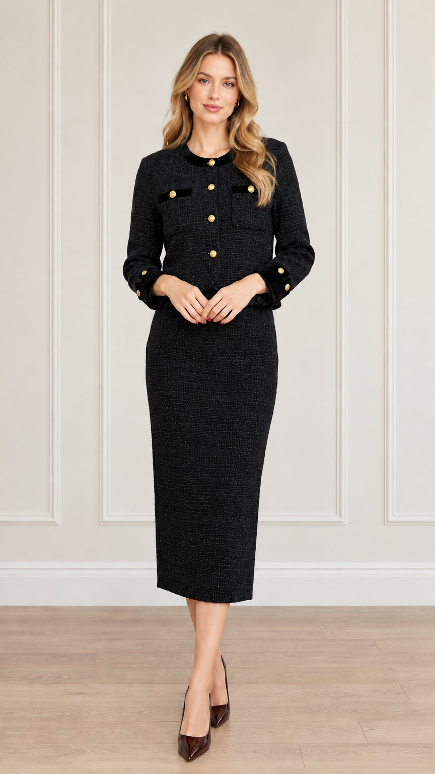 Full-length front view of women's black tweed skirt suit set with contrast trim