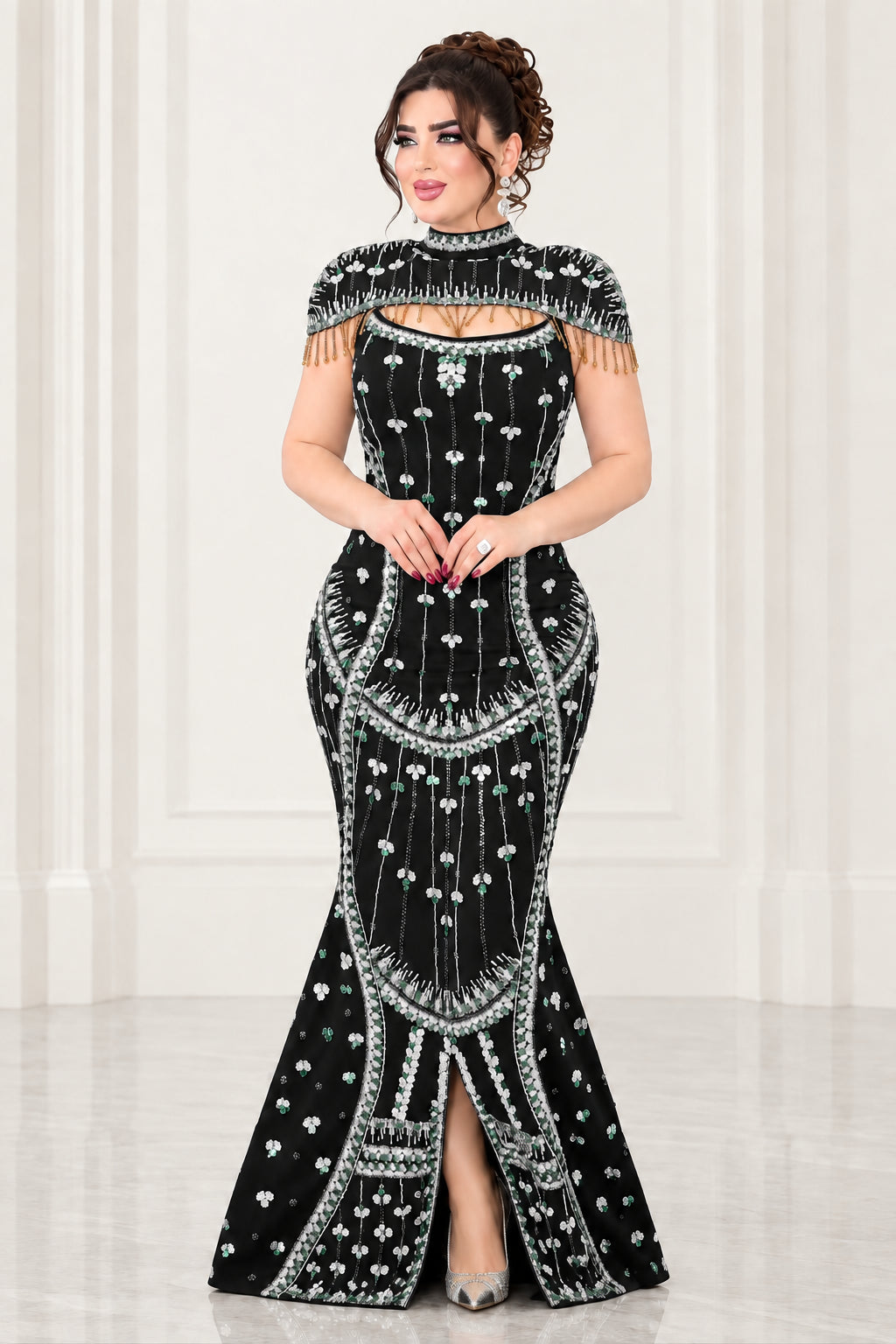 Full-length view of black rhinestone embellished mermaid evening dress with beaded capelet