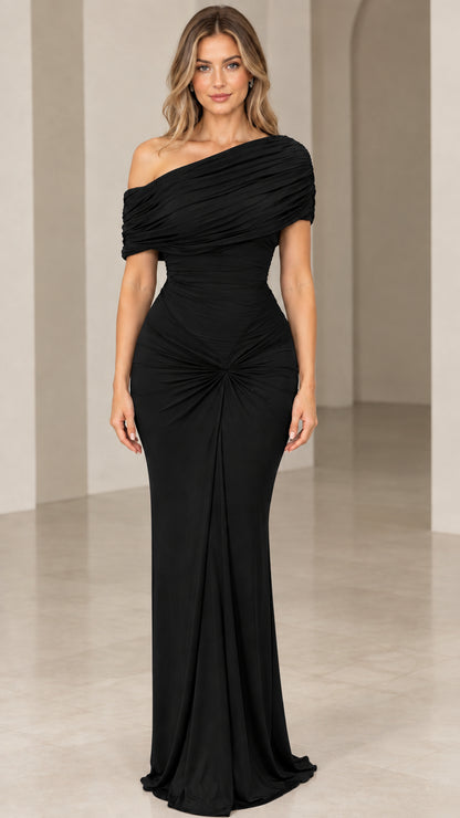 Front view of model wearing black one-shoulder ruched maxi formal dress