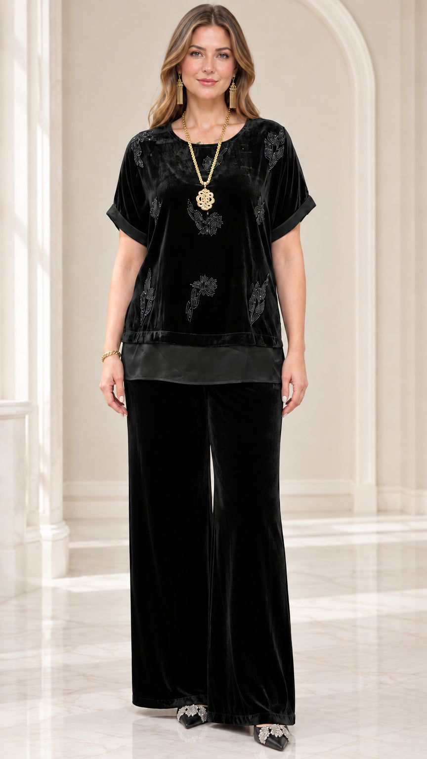 Full front view of model wearing Black beaded velvet top and wide leg pants set
