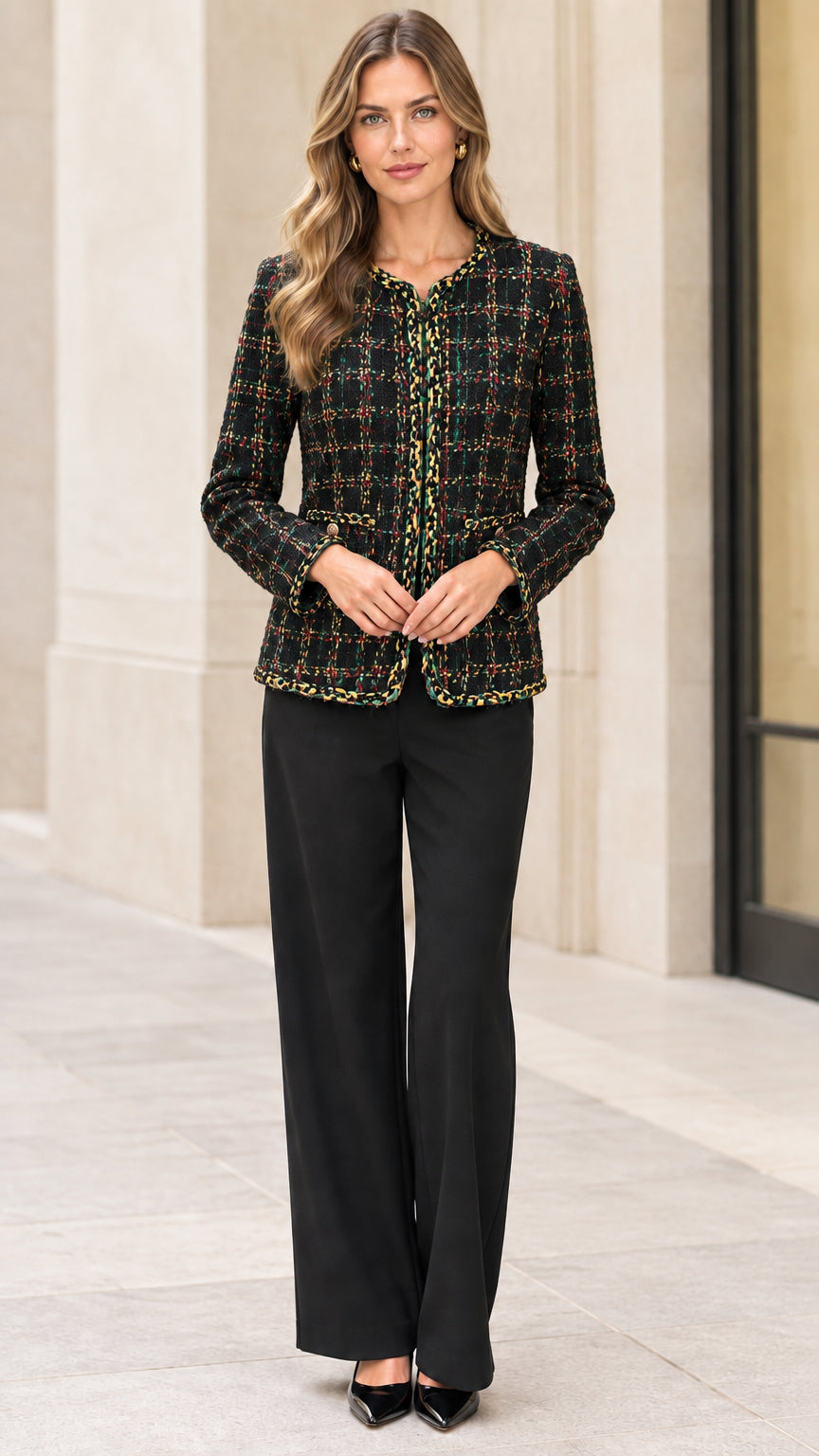 Full front view of a woman wearing a black plaid tweed jacket