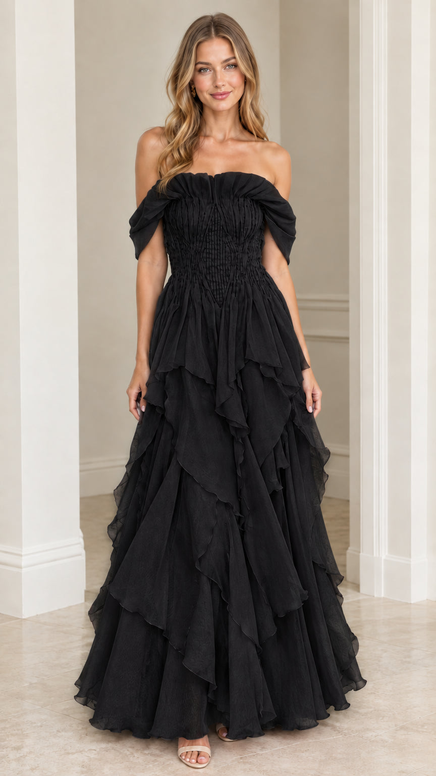 Front view of model wearing Black off-the-shoulder tiered ruffle maxi gown