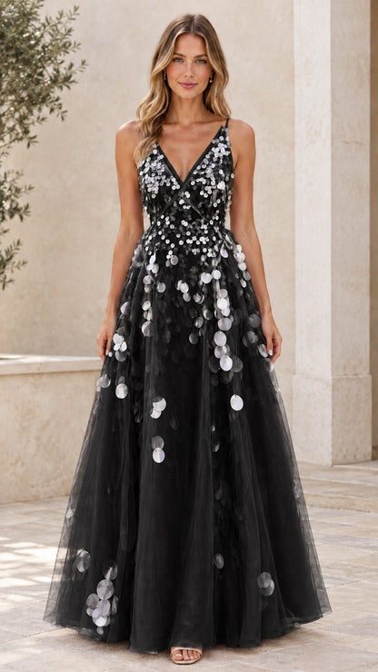 Black tulle A-line evening dress with silver petal appliqués