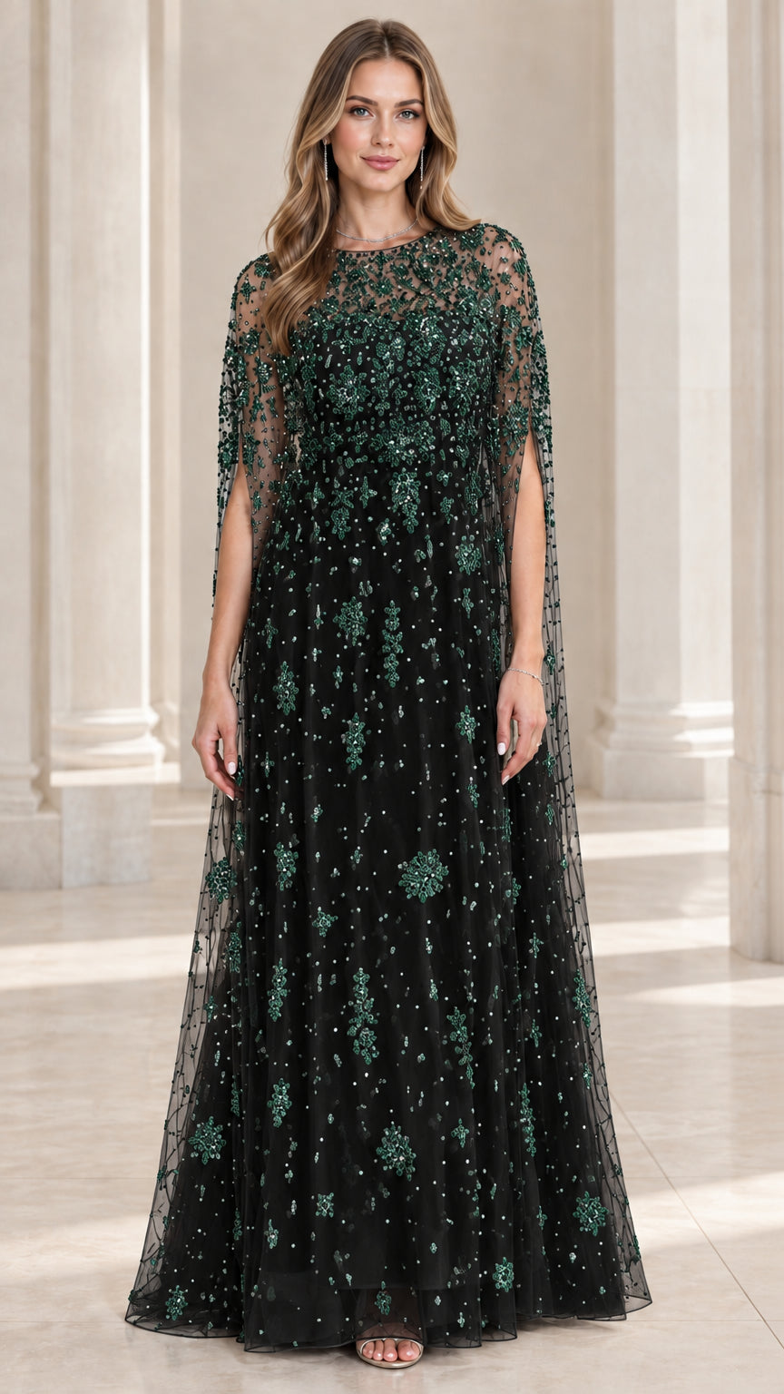 Black cape evening dress with emerald green sequin embroidery