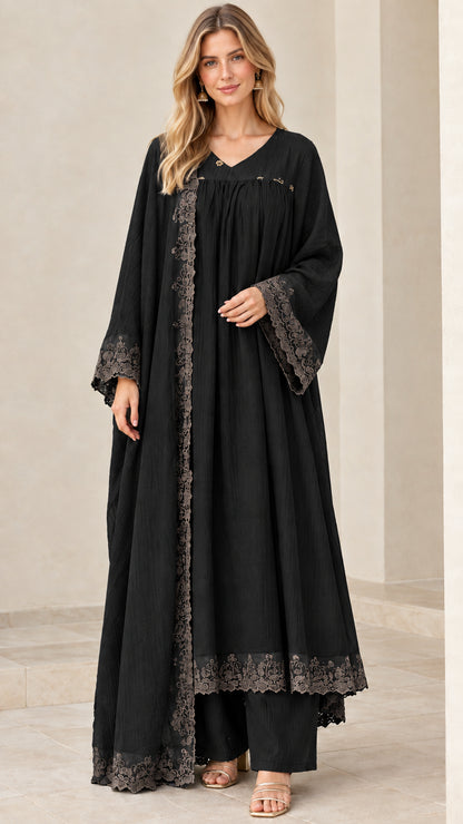 Model wearing black 3-piece modest abaya cardigan and wide-leg pant set