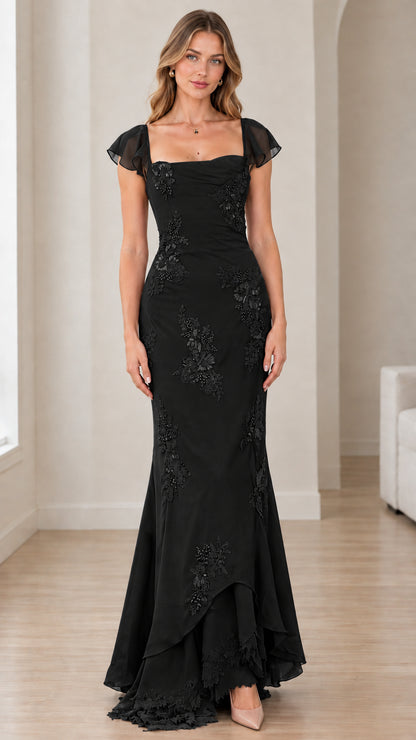 Front view of black beaded square neck mermaid evening dress