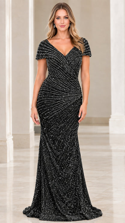 Front view of model wearing the black sequined mermaid evening gown