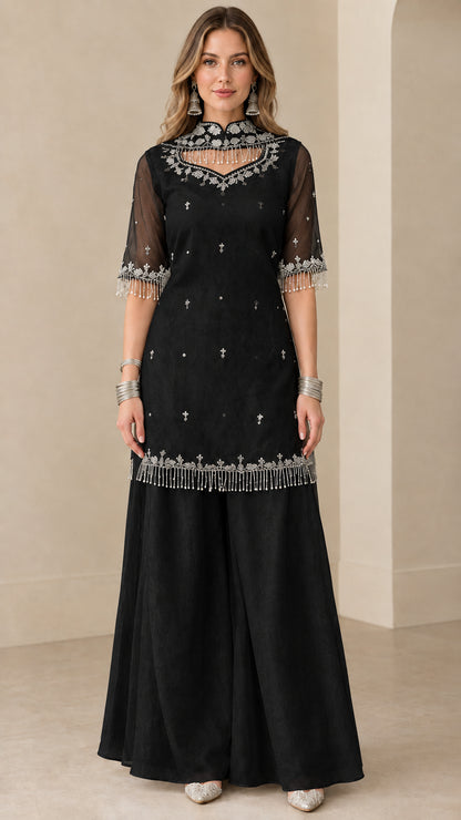 Front view of black embroidered kurti sharara suit set