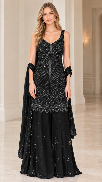Model wearing Black embellished sleeveless kurti sharara suit set
