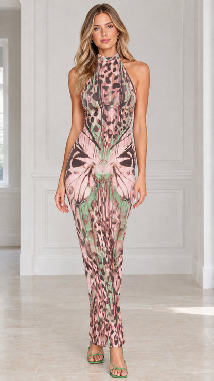 Front view of blush pink butterfly animal print halter maxi dress