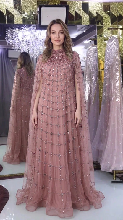 Dusty rose beaded high neck cape sleeve gala gown