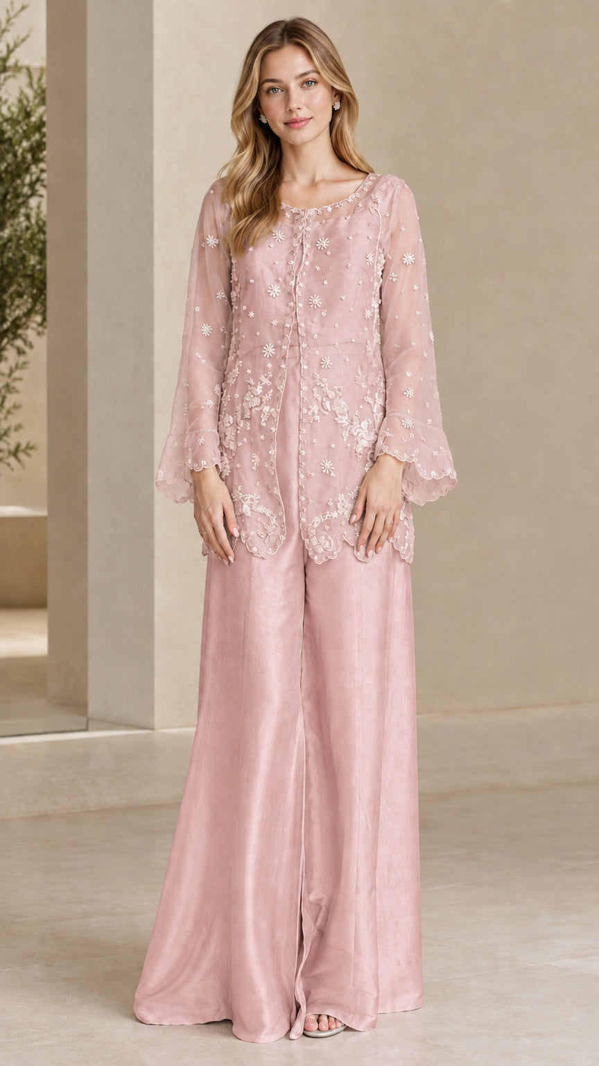Model wearing Dusty Pink embroidered tunic top and flowing wide leg trousers