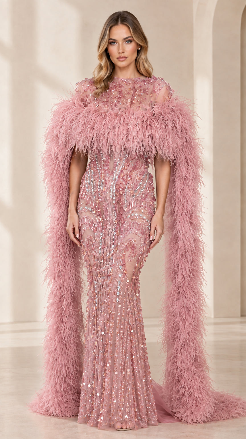 Full-length view of blush pink sequin evening gown with blush feather cape