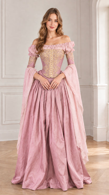 Front view of woman modeling dusty pink medieval ball gown with flowing sleeves