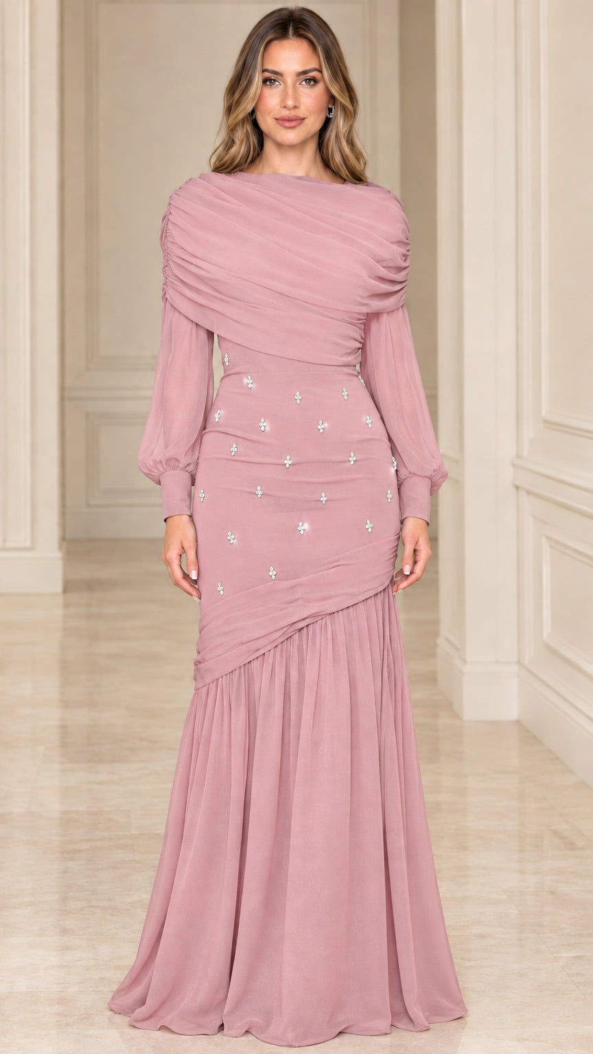 Model wearing dusty rose pink draped long sleeve evening maxi dress