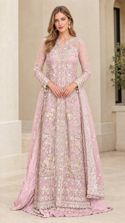 Model wearing dusty pink embroidered long sleeve formal gown with sweeping A-line skirt