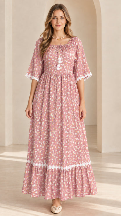 Front view of model wearing dusty pink floral lace trim maxi dress