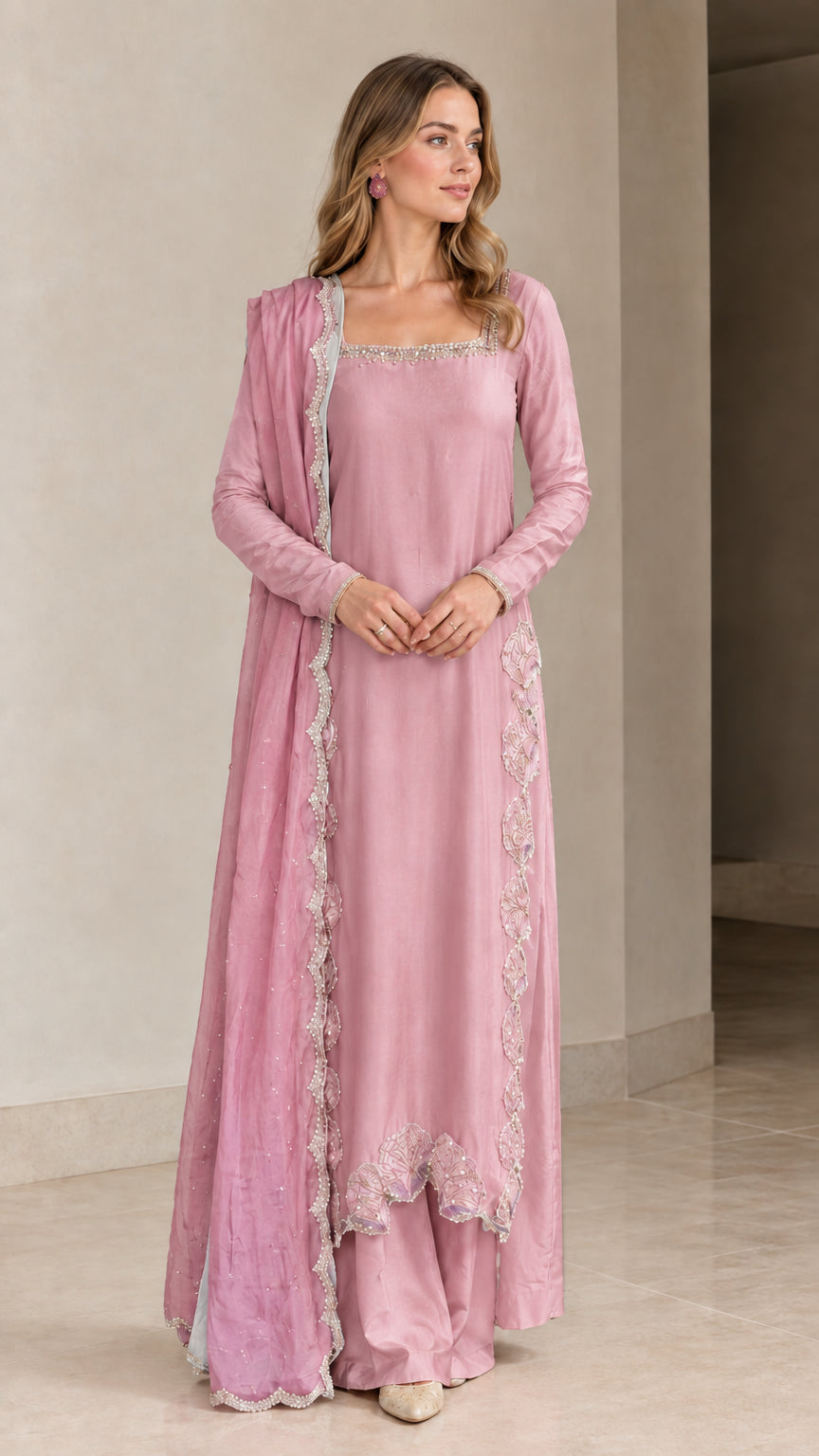 Model wearing Blush Pink longline tunic suit set with matching trousers and dupatta