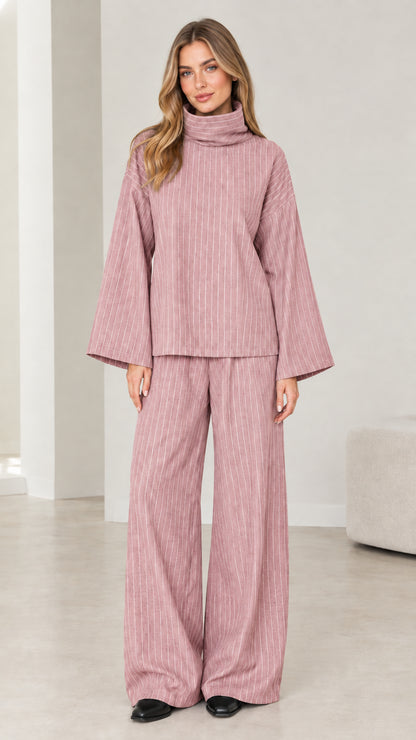 Woman wearing Dusty Pink pinstripe turtleneck and wide-leg pants two-piece set