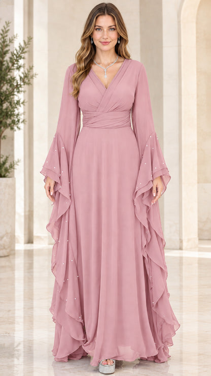 Front view of woman wearing Dusty Rose pink chiffon maxi evening dress with bell sleeves