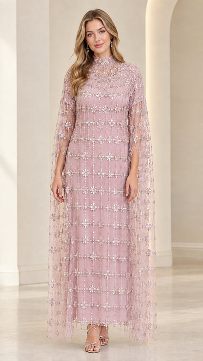 Front view of model in Blush Pink crystal-embellished cape maxi dress