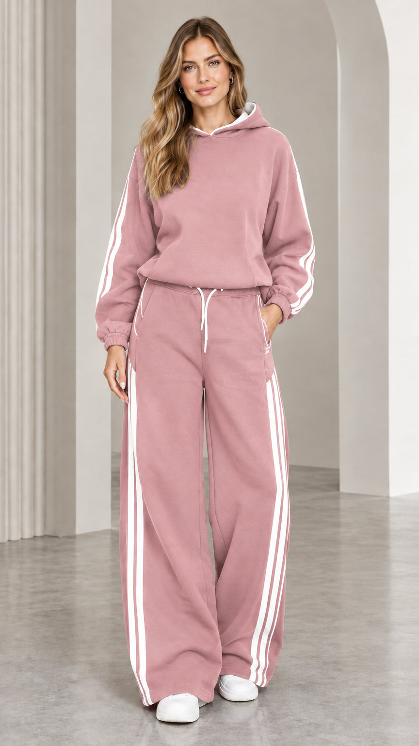 Dusty pink two-piece hoodie and wide leg sweatpants tracksuit set with white side stripes