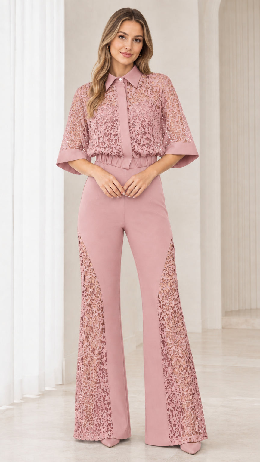Front view of model wearing dusty pink floral lace flare jumpsuit