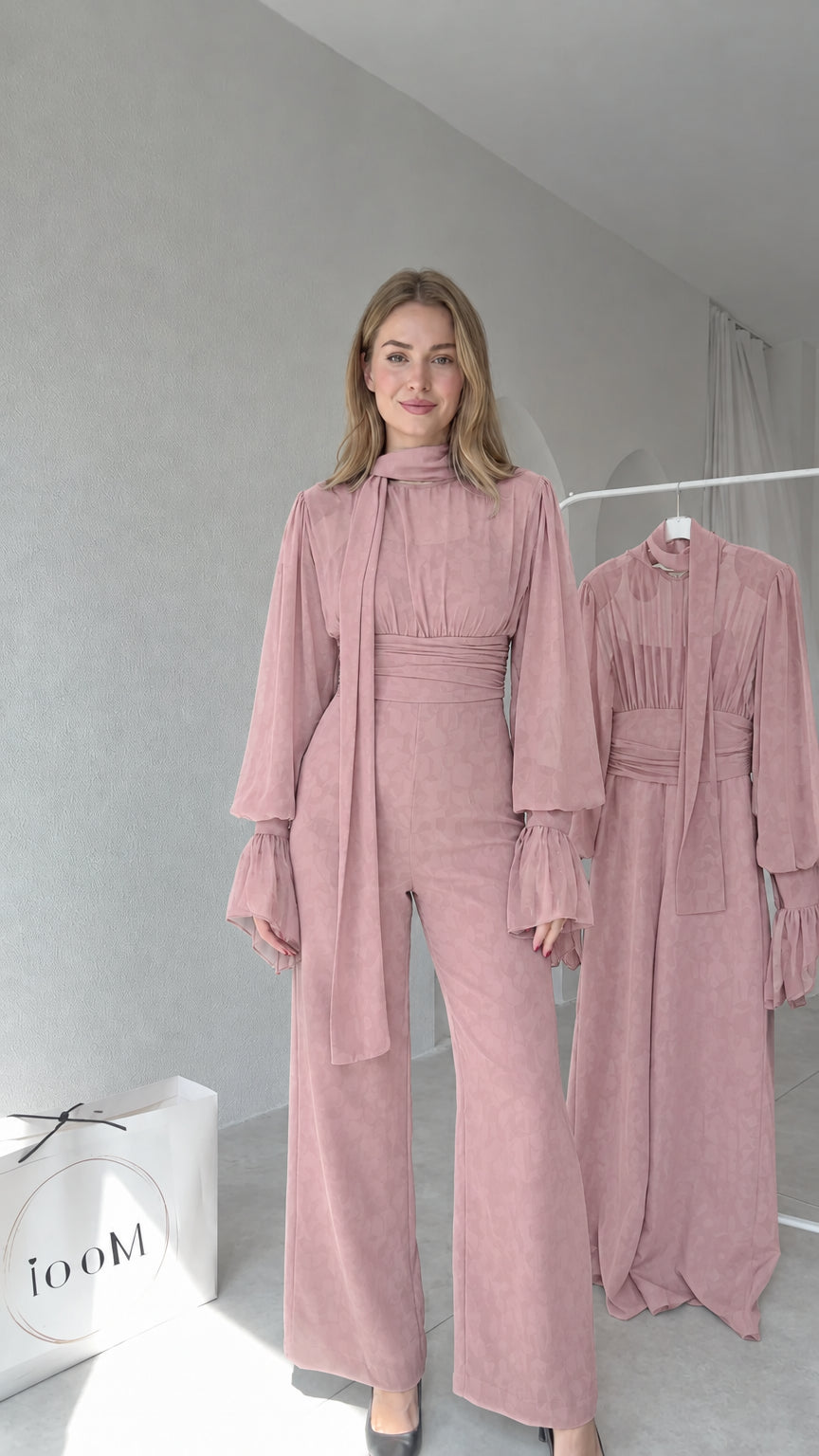 Full front view of model wearing Dusty Rose tie-neck wide-leg jumpsuit