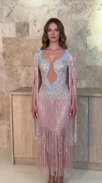 Front view of model wearing blush pink beaded fringe evening gown