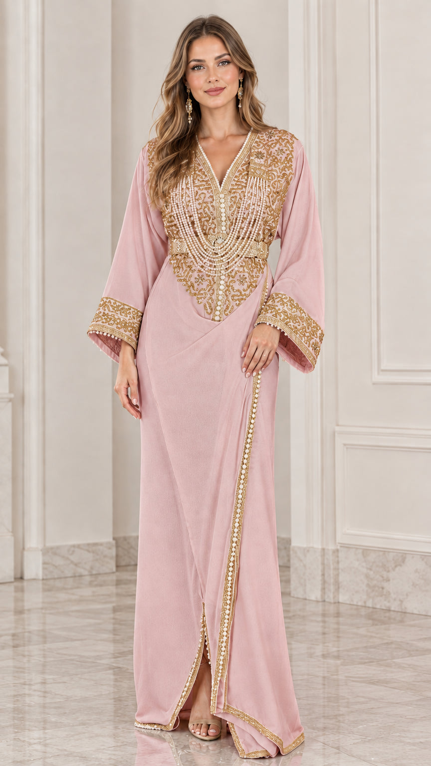 Front view of model wearing dusty pink kaftan maxi dress with gold embroidery