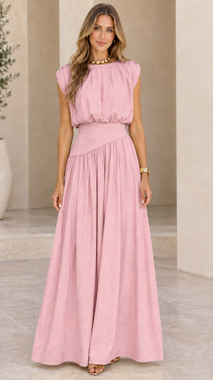 Model wearing dusty pink sleeveless pleated waist maxi dress