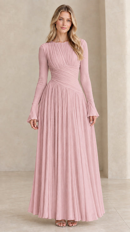 Model wearing dusty pink long sleeve pleated formal maxi dress