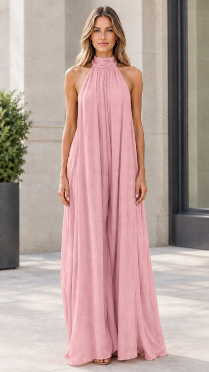 Front view of model wearing soft pink halter neck wide-leg jumpsuit