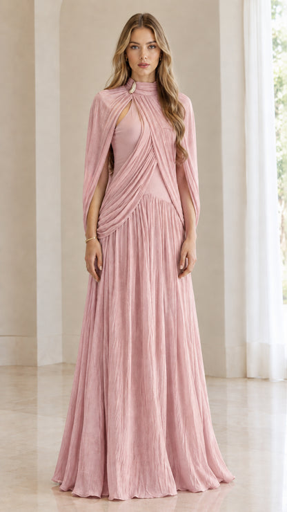 Front full-length view of woman wearing dusty pink pleated cape-sleeve evening gown