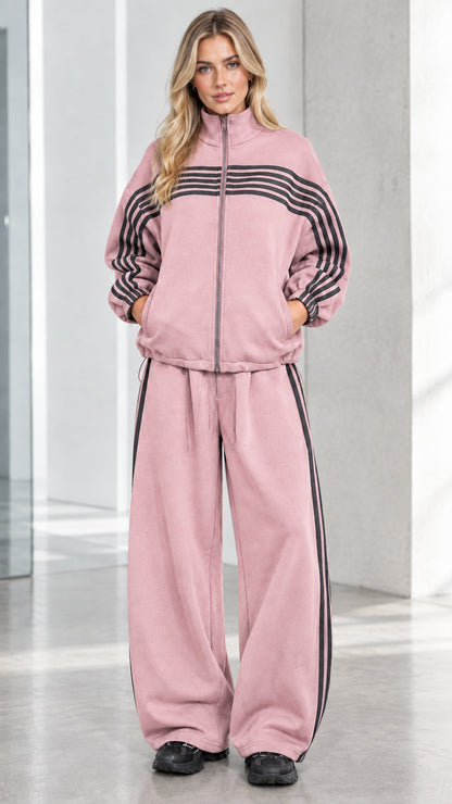 Front full view of woman wearing Dusty Pink striped zip-up track jacket and wide-leg sweatpants set