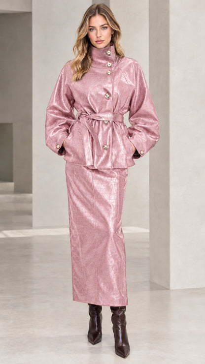 Woman wearing Dusty Pink croc-embossed faux leather belted jacket and matching maxi skirt set