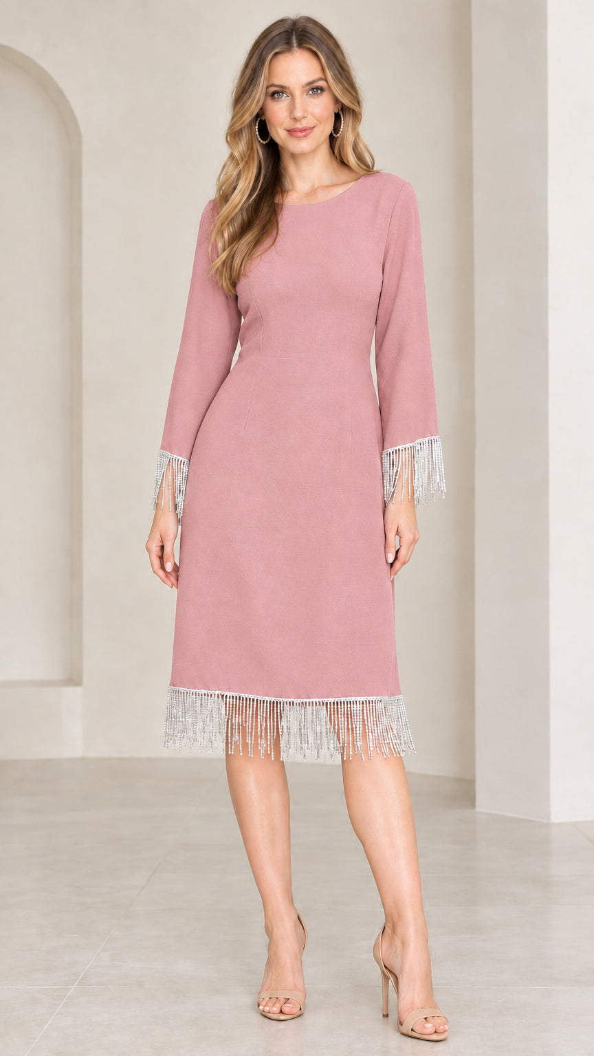 Front view of dusty pink knee-length cocktail dress with rhinestone fringe
