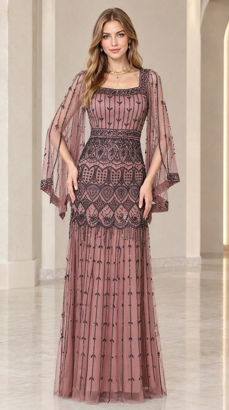Front view of model wearing dusty rose pink beaded formal maxi dress with split bell sleeves