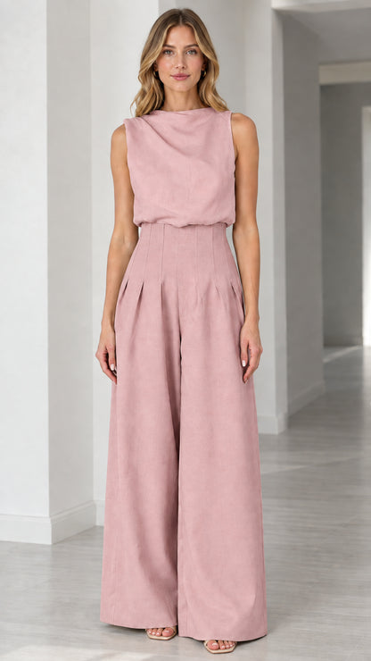 Full-length view of solid dusty pink sleeveless wide-leg pleated jumpsuit