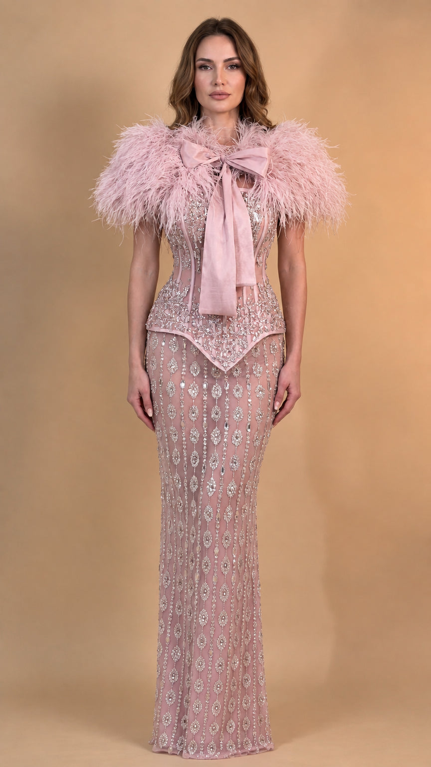 Front view of model wearing Blush Pink feather trim sequin corset evening dress