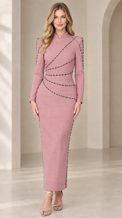 Front view of model wearing dusty pink long sleeve beaded column evening dress