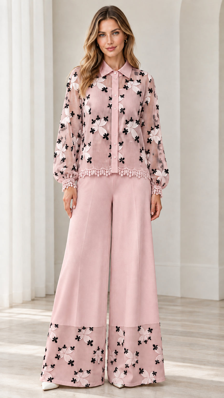 Model wearing dusty pink floral embroidered lace shirt and wide leg pant set