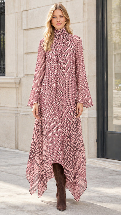Model wearing Dusty Rose printed long sleeve handkerchief hem dress