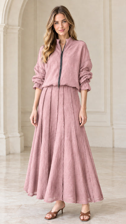 Full front view of dusty pink textured zip-front top and pleated maxi skirt set