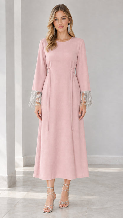 Front view of blush pink long sleeve maxi dress with rhinestone fringe