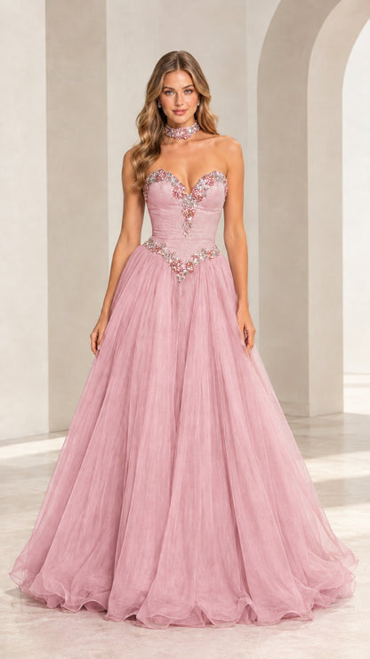 Model wearing soft pink strapless beaded tulle ball gown