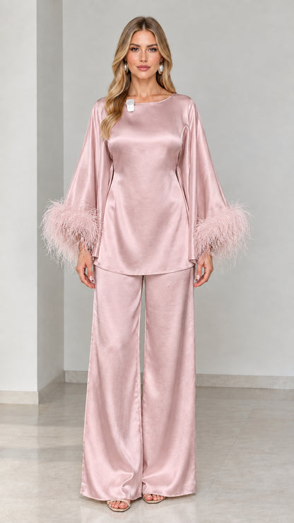 Blush pink satin two-piece tunic and wide-leg pants set with feather trim