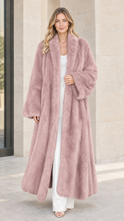 Front view of woman wearing dusty pink long faux fur maxi coat